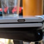 User photos of cracks in the plastic around the USB-C port